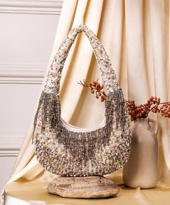 Silver raw silk hand embroidered potli bag 1