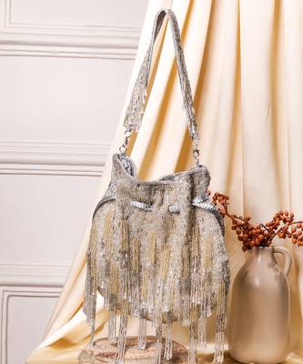 Silver raw silk hand embroidered potli bag 2