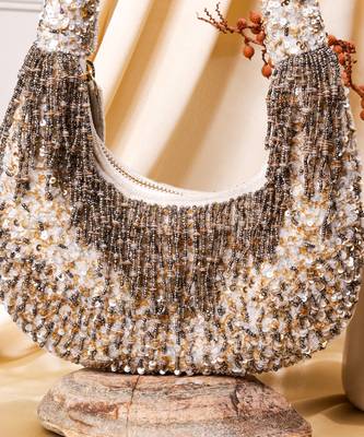 Silver raw silk hand embroidered potli bag 3
