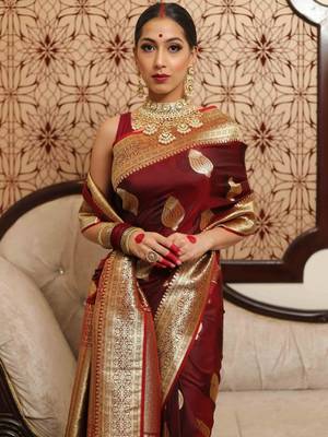 Maroon woven kanjeevaram jacquard silk blend saree with blouse piece 1