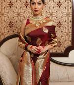 Maroon woven kanjeevaram jacquard silk blend saree with blouse piece