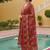 Women red rayon blend floral printed straight kurta trousers with dupatta