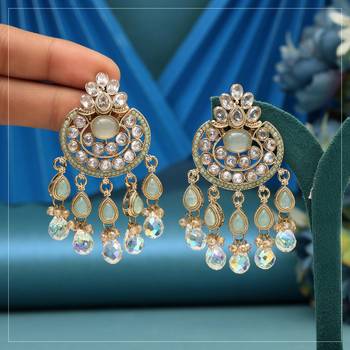 Pista green color american diamond earrings 1