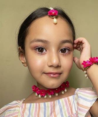 Noor floral set of necklace, 2 bracelets & mang teeka in a dark pink colour 1