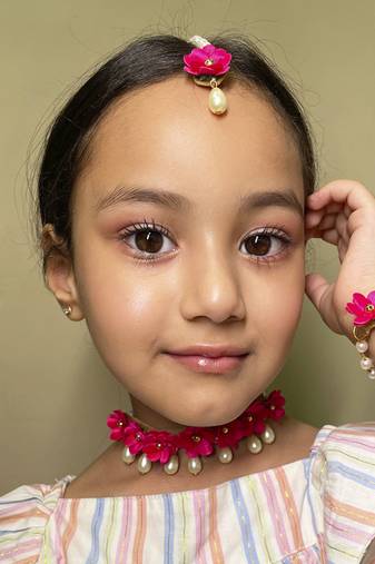 Noor floral set of necklace, 2 bracelets & mang teeka in a dark pink colour