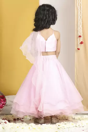 Pearl work on blouse with organza lehanga