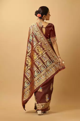 Brown woven design silk blend saree with blouse