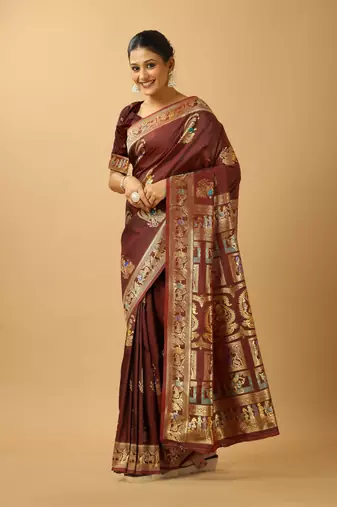 Brown woven design silk blend saree with blouse