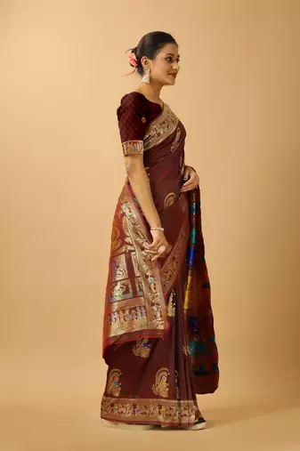 Brown woven design silk blend saree with blouse
