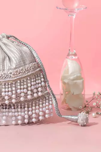 Sia pearl silver potli