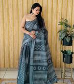 Teal woven linen saree with blouse piece