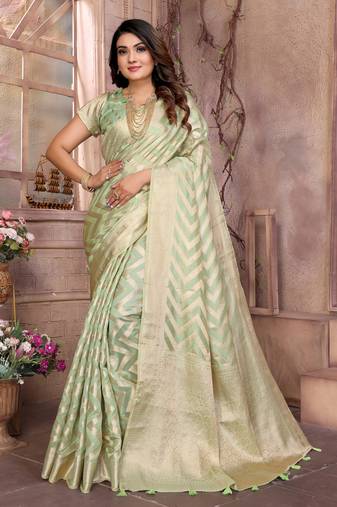 Green woven organza silk saree with blouse piece