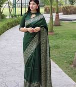 Green solid design with kalamkari woven border