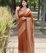 Orange solid design with kalamkari woven border saree
