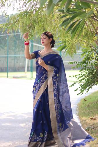 Blue thread woven design with zari woven border