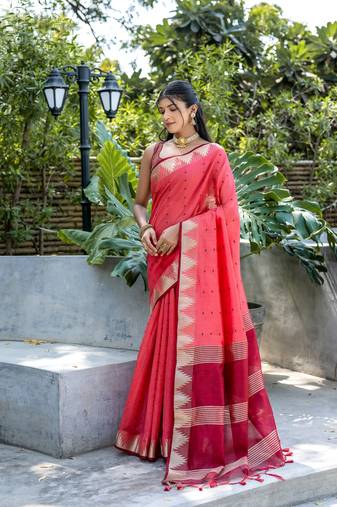 Peach zari woven triangle border with butti weaves saree