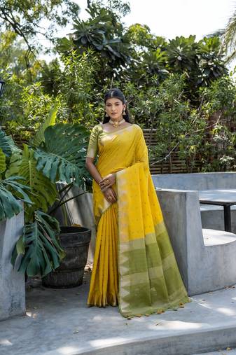 Yellow zari woven triangle border with butti weaves saree