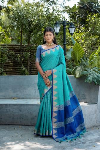 Rama zari woven triangle border with butti weaves saree