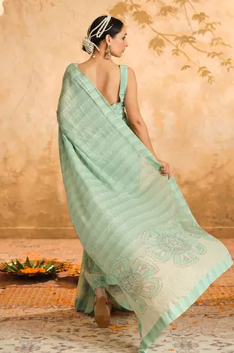 Doree aqua floral chintz saree with unstiched blouse piece