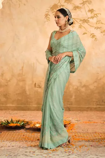 Doree aqua floral chintz saree with unstiched blouse piece