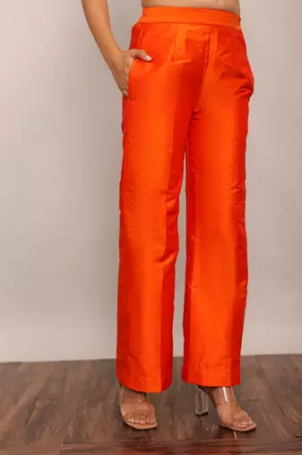 Orange solid pant with belt in back