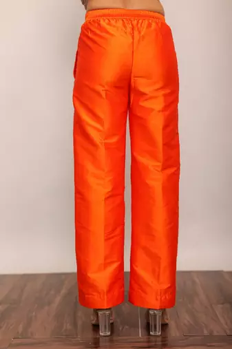 Orange solid pant with belt in back