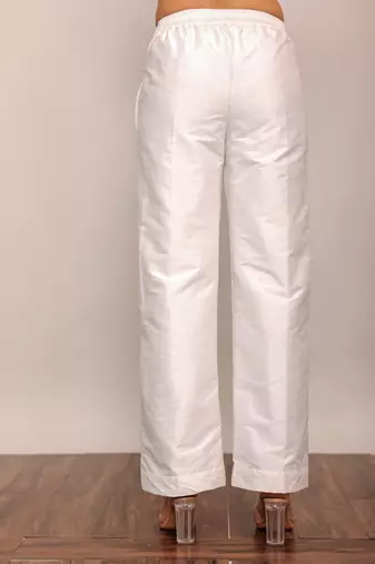 White solid pant with belt in back