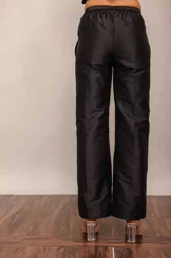 Black solid pant with belt in back