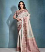 Sea green all over zari woven body with printed border