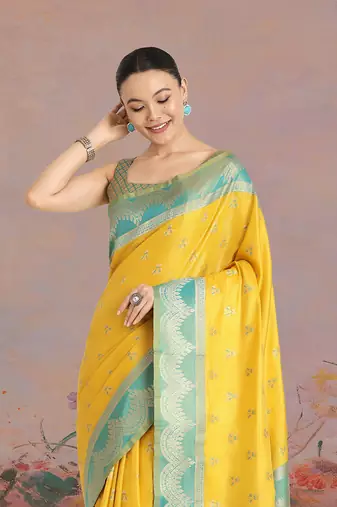 Yellow weaving banarasi tissue silk blend saree