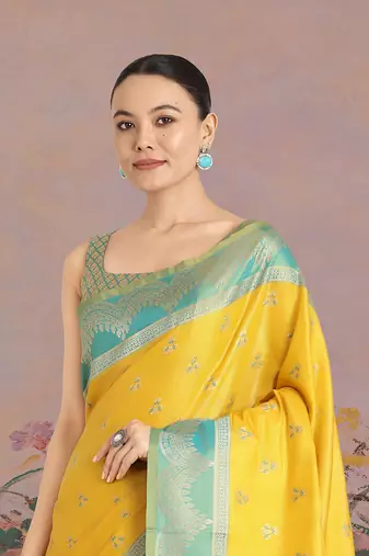 Yellow weaving banarasi tissue silk blend saree