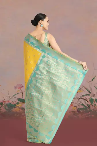 Yellow weaving banarasi tissue silk blend saree