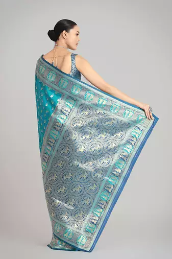 Turquoise blue color weaving banarasi silk blend saree