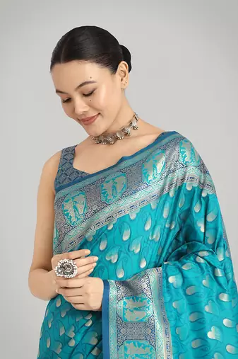 Turquoise blue color weaving banarasi silk blend saree