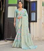 Sea green zari woven border with all over pichwai printed saree