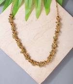 Golden bead and green gemstone necklace