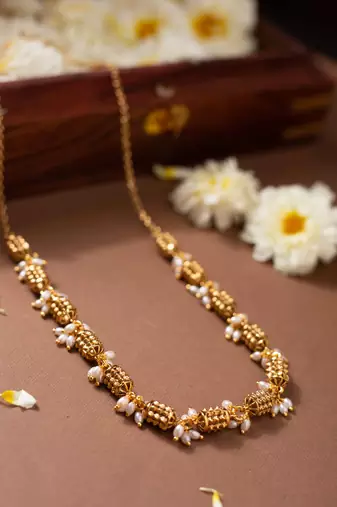 Golden pearl necklace set