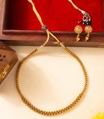 High gold chain necklace with circular detailing and matching earrings