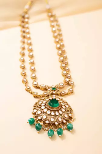 Kundan pendant necklace set with green beads