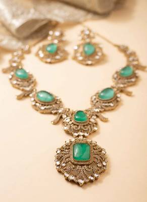 American diamond necklace set with emerald accents 2