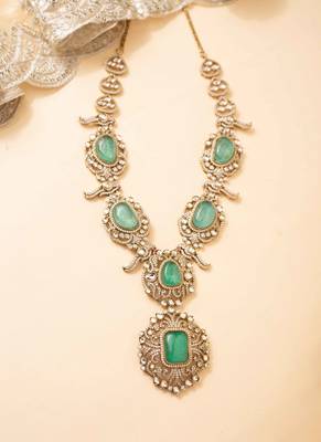 American diamond necklace set with emerald accents 3
