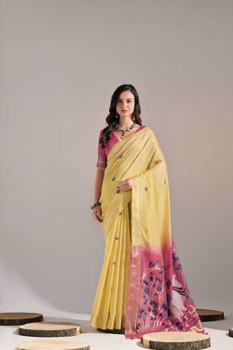 Yellow cow design thread woven pallu with butti weaves
