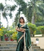Green zari woven border and pallu saree