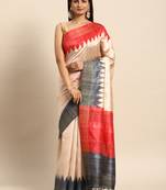 Grey solid design with temple border saree