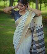 Off White Embroidered Linen Saree with Blouse