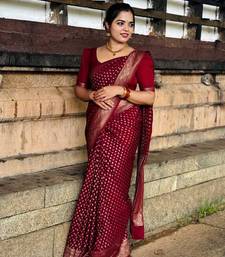 Maroon color silk blend sarees with blouse