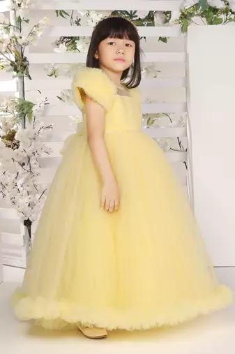 yellow pleated yoke gown with gather puff sleeve net gown for girls