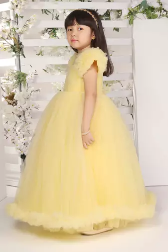 yellow pleated yoke gown with gather puff sleeve net gown for girls