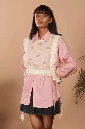 Baby pink nirvi shirt & a netted bib on top