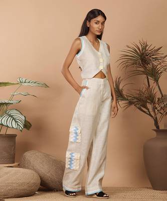 Beige crop top with medium broad pants with abstract print long jacket 1